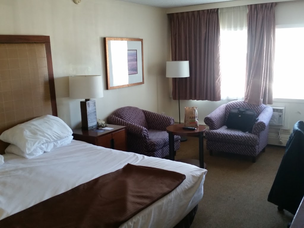 Travelodge by Wyndham Calgary South | 7012 Macleod Trail S, Calgary, AB T2H 0L3, Canada | Phone: (403) 253-1111