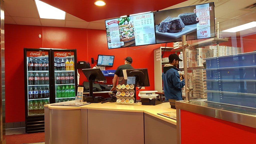 Dominos | 3059 Portage Avenue West, Winnipeg, MB R3K 0W4, Canada | Phone: (204) 987-5555
