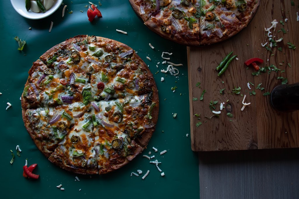 Top in Town Pizza & Wings | 20121 Willowbrook Dr, Langley, BC V2Y 0L3, Canada | Phone: (604) 427-3435