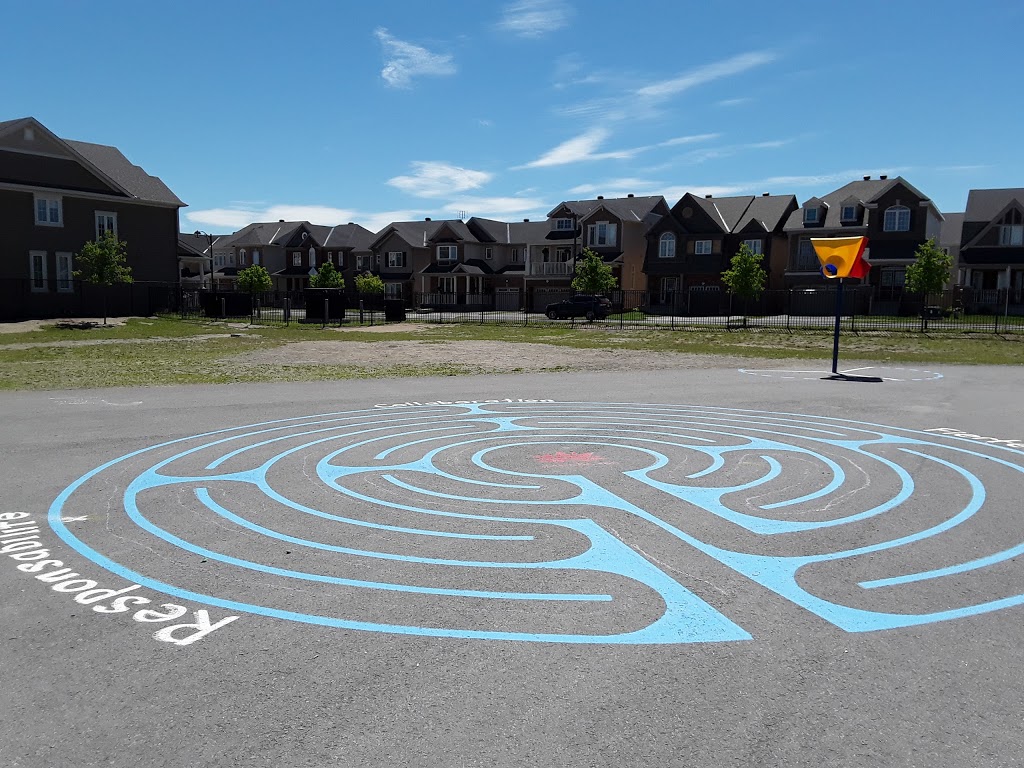 École élémentaire catholique Sainte-Kateri | 2450 River Mist Rd, New Barrhaven, ON K2J 5W5, Canada | Phone: (613) 741-6754
