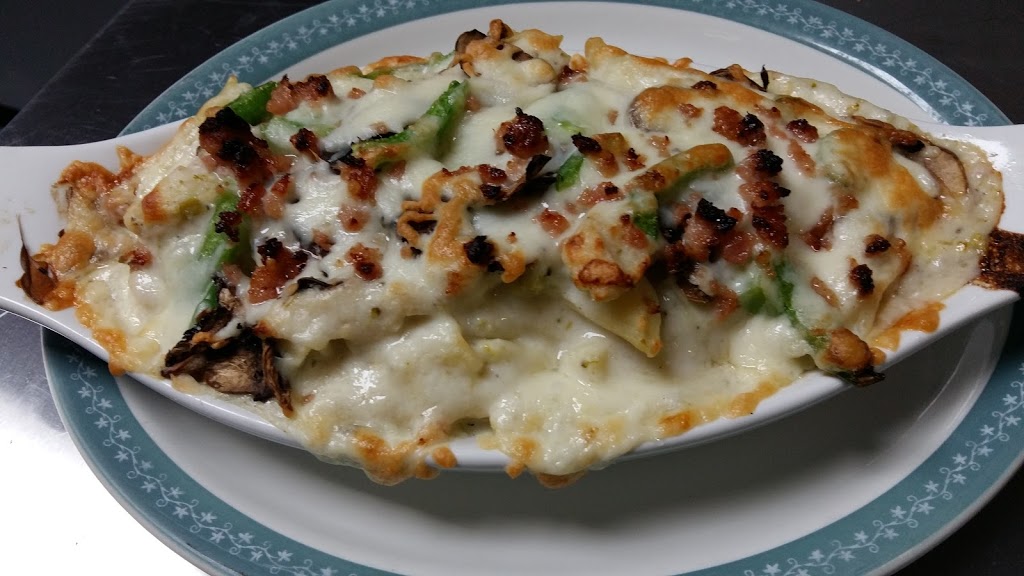 Prudhomme Pub and Pizzeria /Shop N Stay Grocery | 12 Railway Ave, PrudHomme, SK S0K 3K0, Canada | Phone: (306) 654-9101