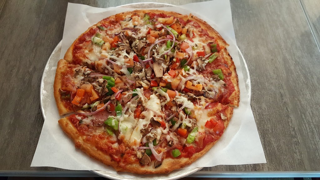 Rebel Pizza | 2188 McPhillips St #9, Winnipeg, MB R2V 3C8, Canada | Phone: (204) 615-6575