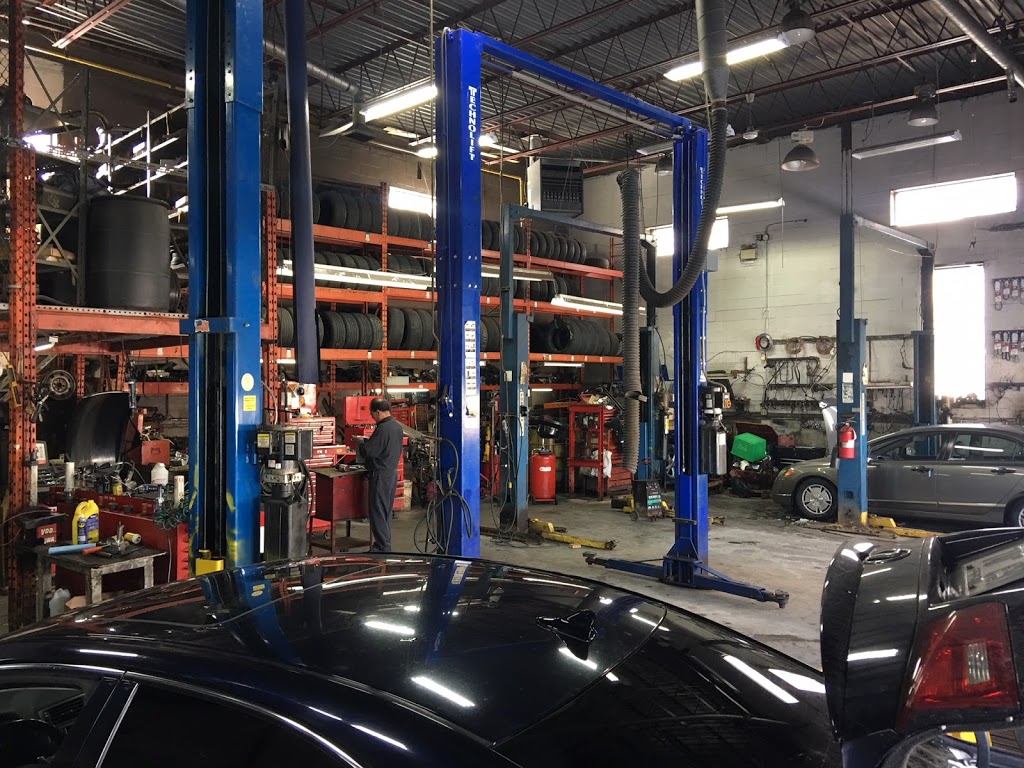 Garage Dasso - Mécanique Générale & Carrosserie | 595 Rue Saint-Charles Est, Longueuil, QC J4H 1B8, Canada | Phone: (450) 677-5522