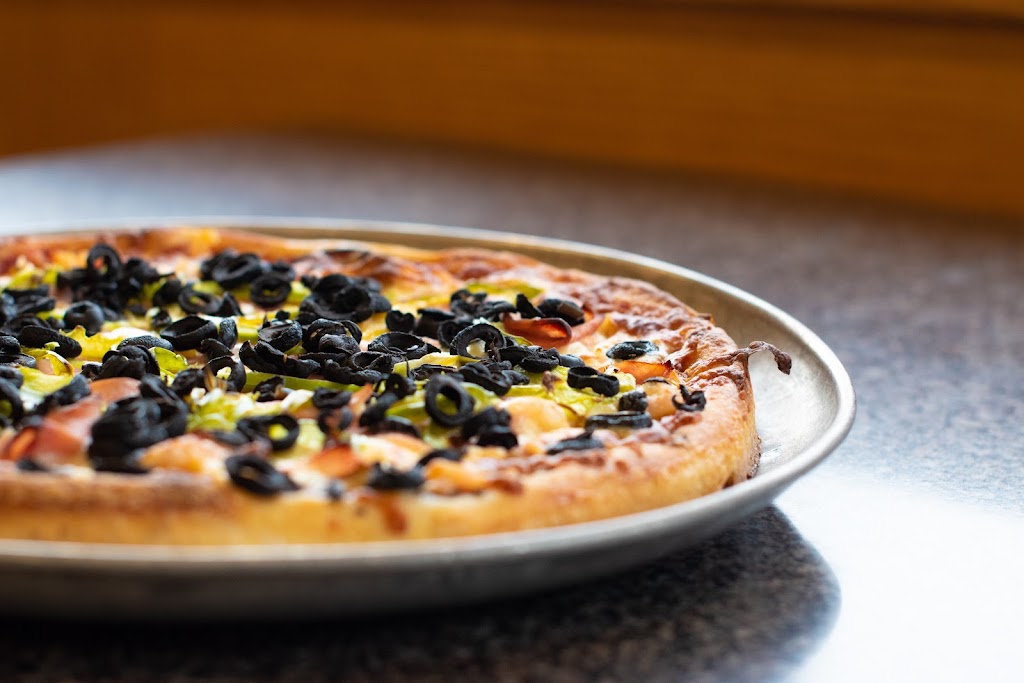 Top Pizza & Spaghetti House | 1101 4 Ave S, Lethbridge, AB T1J 0P8, Canada | Phone: (403) 327-1952