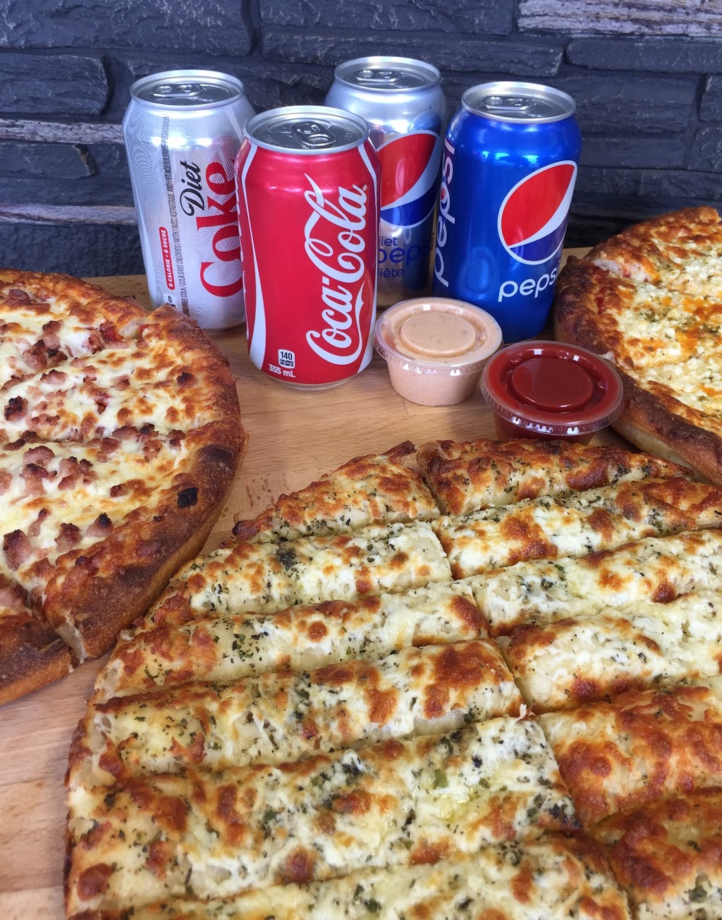Bow Tie Pizza (Centre St) | 4817b Centre St N, Calgary, AB T2E 2Z6, Canada | Phone: (403) 299-0000