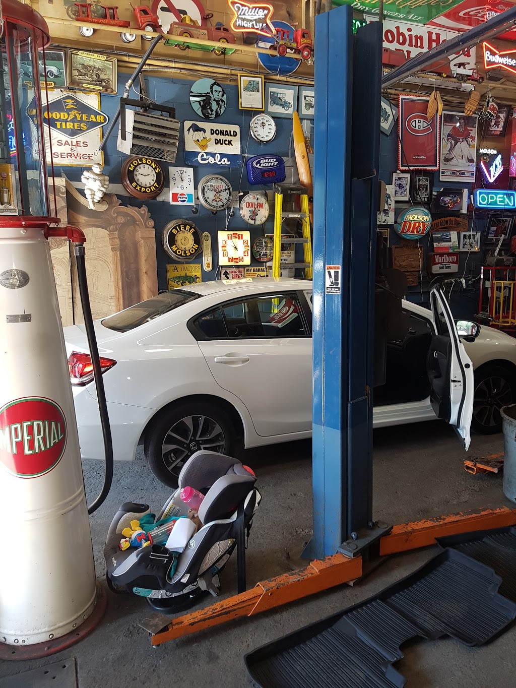 Garage Henriquez | 2001 Rue Centre, Montréal, QC H3K 1J1, Canada | Phone: (514) 933-4493
