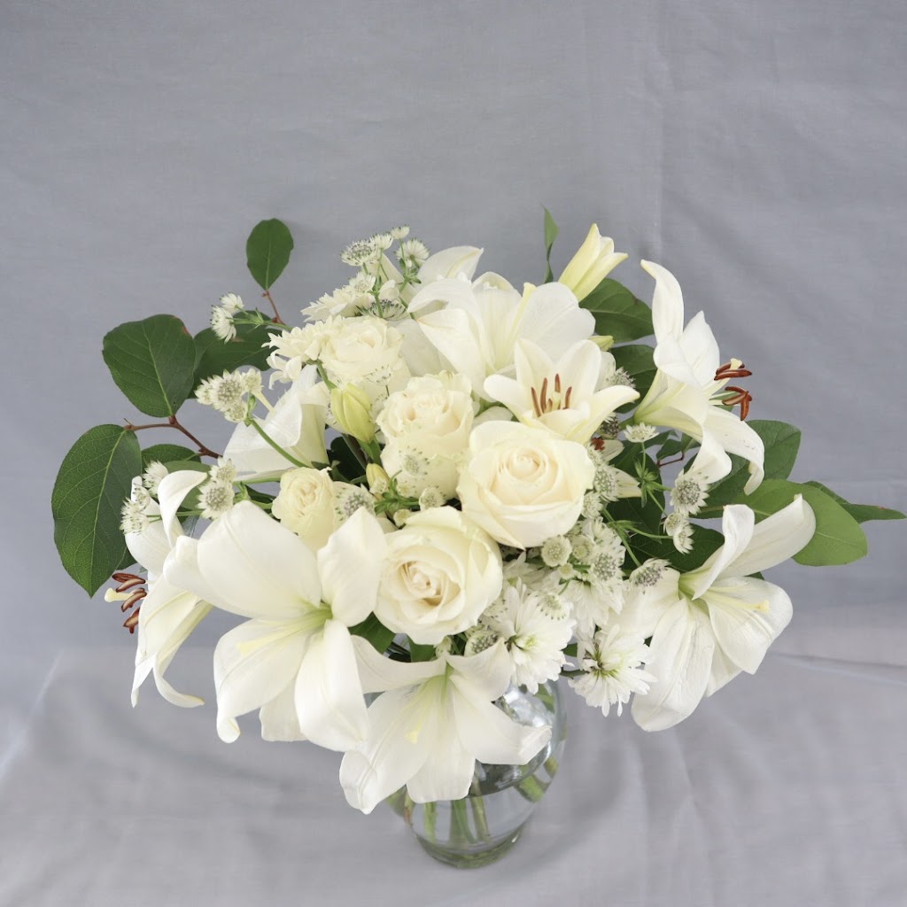 Green vase Flower | 46 Aspen Stone Manor SW, Calgary, AB T3H 0H3, Canada | Phone: (403) 870-6557