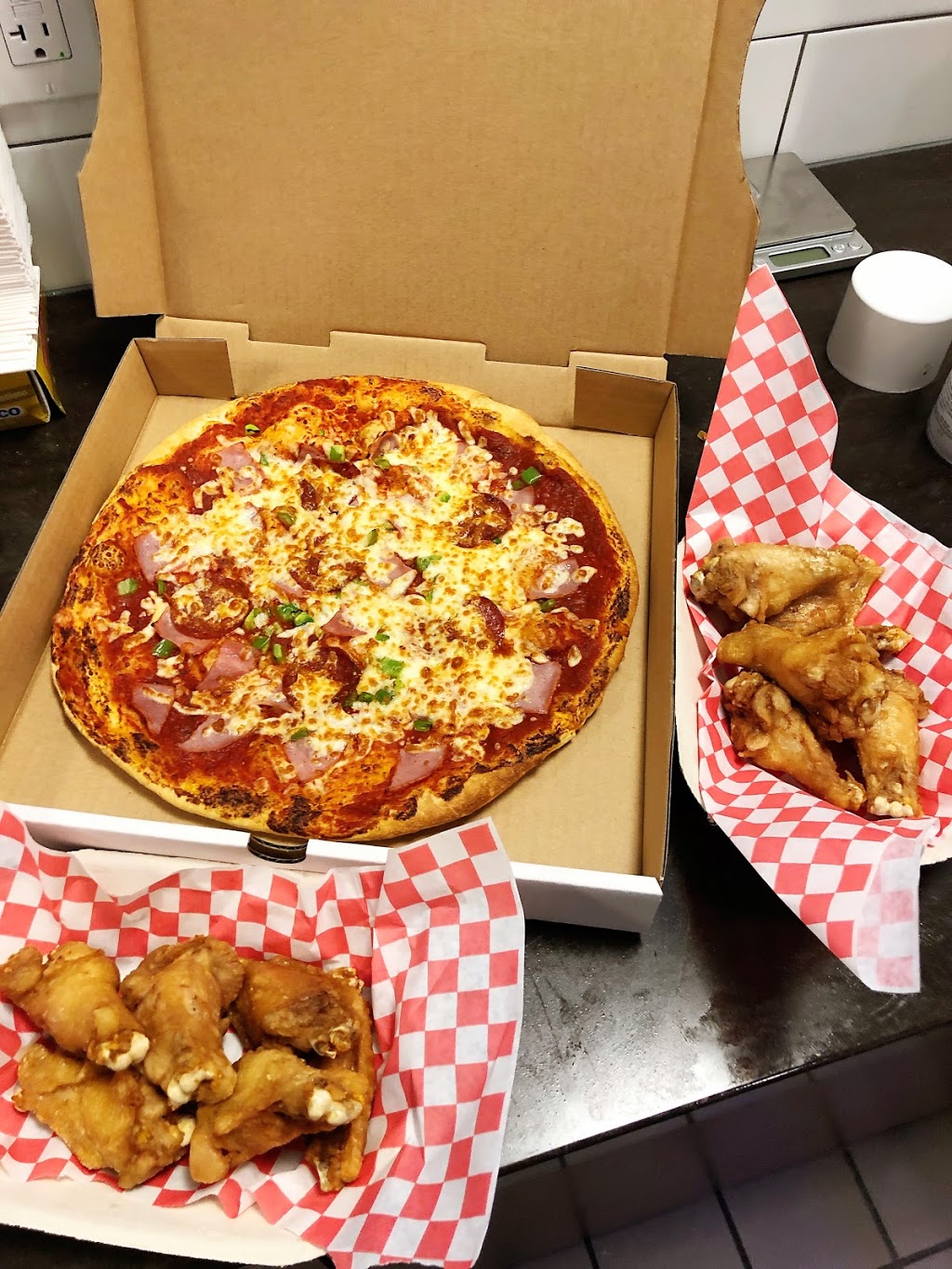 UToppings Pizza & Cafe | 2826 Morley Trail NW, Calgary, AB T2M 4G7, Canada