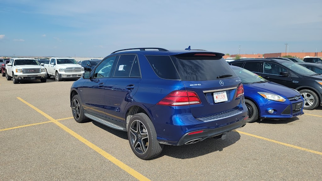Kee West Auto Carriers Inc | 103 East Lake Rd NE, Airdrie, AB T4A 2E9, Canada | Phone: (403) 948-0243