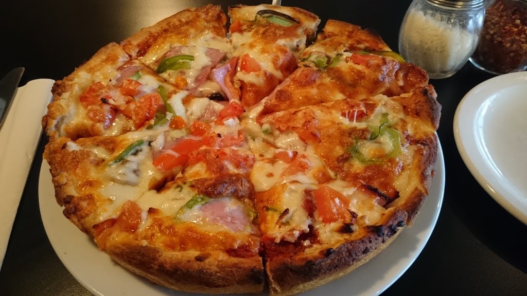 Michaels Pizza Restaurant & Delivery | 139 10 Ave SW, Calgary, AB T2R 0L9, Canada | Phone: (403) 264-6731