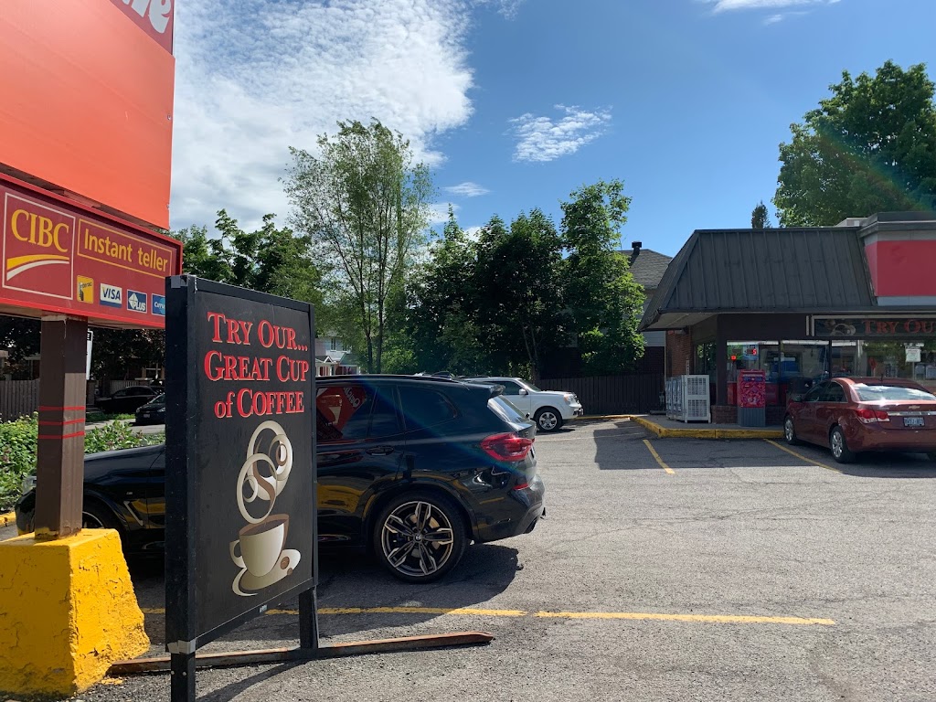Quickie Bank | 1166 Bank St, Ottawa, ON K1S 3X7, Canada | Phone: (613) 730-1113