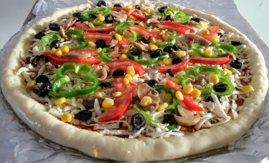 Primo Pizzeria | 3100 Bd de la Concorde E, Laval, QC H7E 2B8, Canada | Phone: (450) 661-9999
