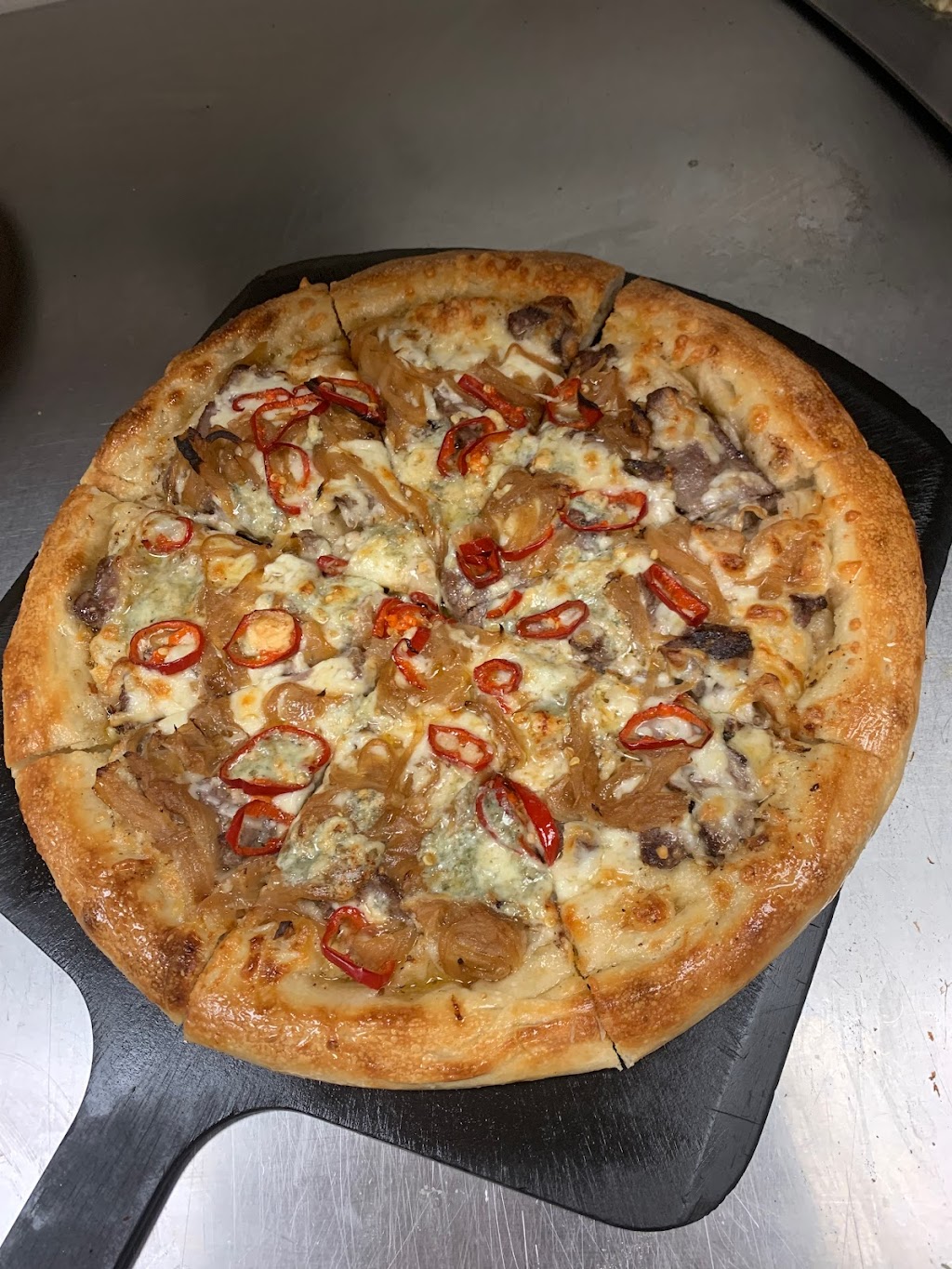 Pink Door Pizza | 4307 130 Ave SE #180, Calgary, AB T2Z 3V8, Canada | Phone: (403) 764-7465