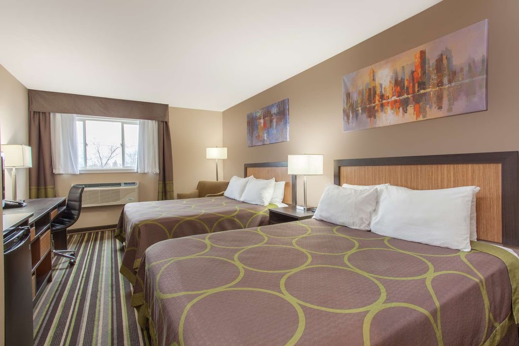 Howard Johnson by Wyndham Winnipeg West | 3740 Portage Ave, Winnipeg, MB R3K 0Z9, Canada | Phone: (204) 272-4169