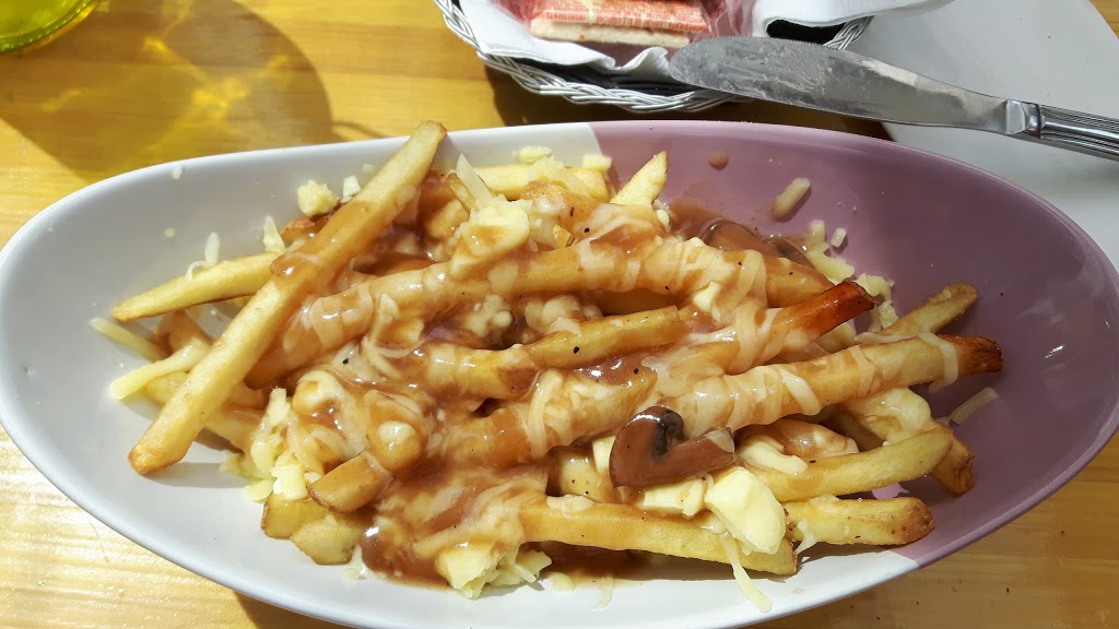 LOrange Bistro | 29 Rue Ambroise Fafard, Baie-Saint-Paul, QC G3Z 2J2, Canada | Phone: (418) 240-1197