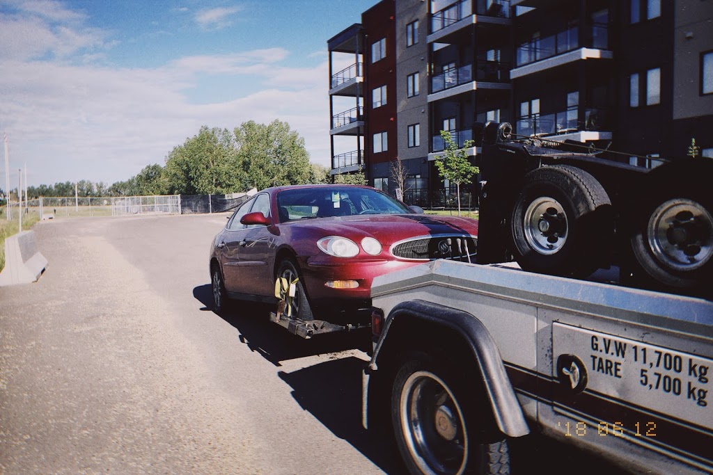 Milestone Towing | 4608 26 Ave NW, Edmonton, AB T6L 5J1, Canada | Phone: (780) 660-9393