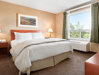 Days Inn & Suites by Wyndham Cochrane | 5 Westside Dr, Cochrane, AB T4C 1M1, Canada | Phone: (403) 932-5588