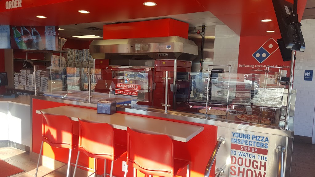 Dominos | 3059 Portage Avenue West, Winnipeg, MB R3K 0W4, Canada | Phone: (204) 987-5555