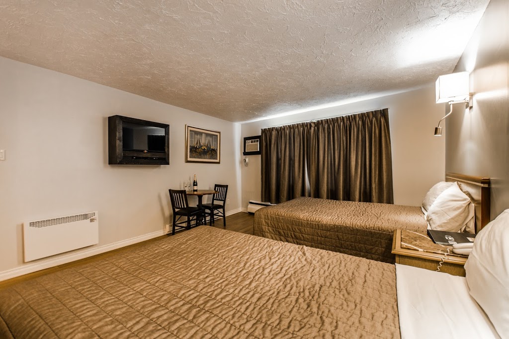 Olux Hotel Motel & Suites | 1354 Boulevard des Laurentides, Laval, QC H7N 4Y4, Canada | Phone: (450) 669-2601