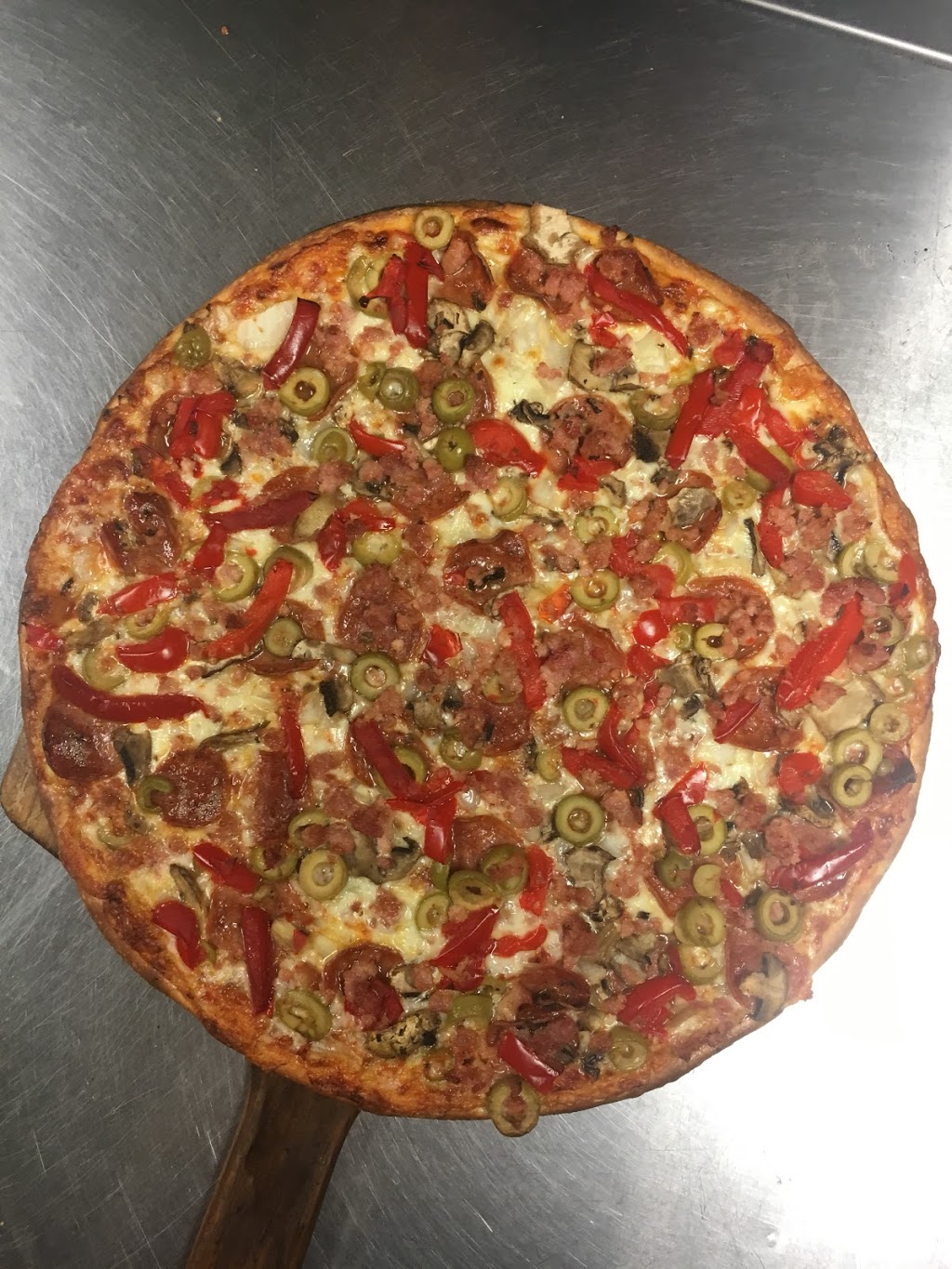 Nonis Pizzeria | 4 Livingston Ave, Grimsby, ON L3M 1K5, Canada | Phone: (905) 309-3553