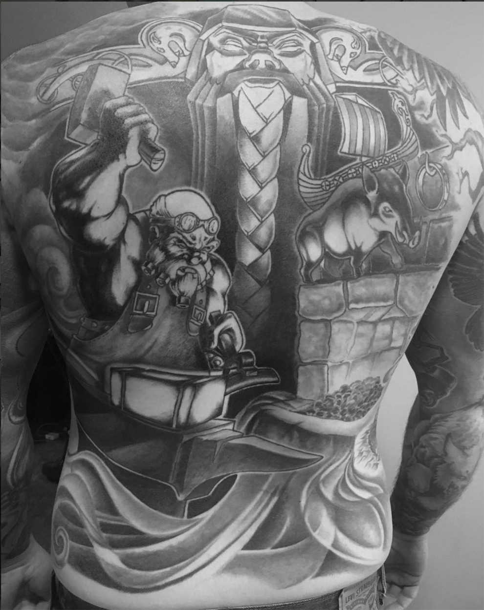 Mammoth Tattoo | 2713 14 St SW #2, Calgary, AB T2T 3V2, Canada | Phone: (587) 356-3577