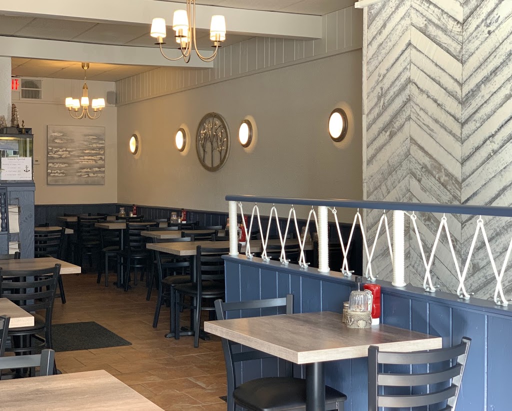 Johns Fish N Chips | 5090 Dundas St W, Etobicoke, ON M9A 1C2, Canada | Phone: (416) 231-3474