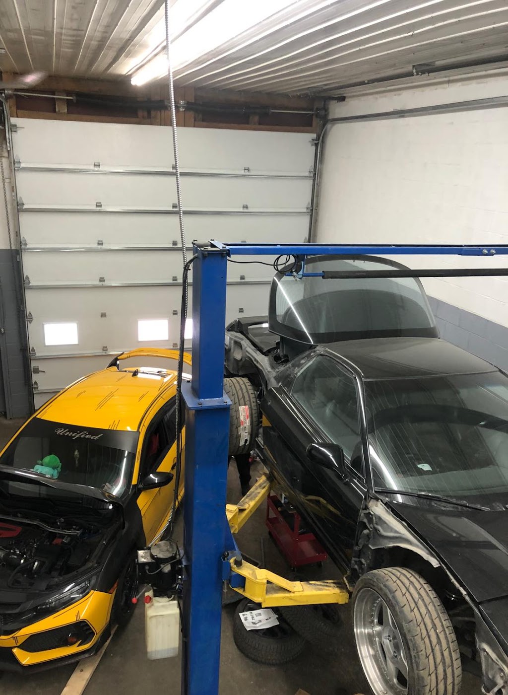 Naizo Garage | 1882 Rue Laurier, Sainte-Catherine, QC J5C 1B8, Canada | Phone: (514) 967-3382