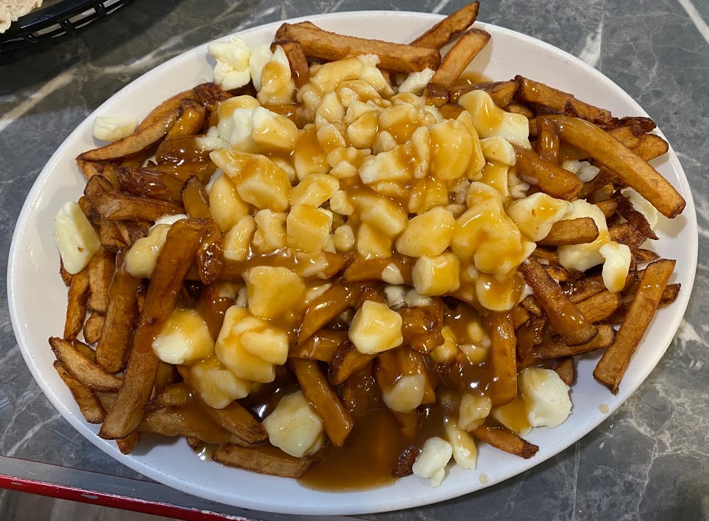 Nouveau Pizzeria Pionnier | 24 Chemin Ridge, Hinchinbrooke, QC J0S 1A0, Canada | Phone: (450) 264-2599