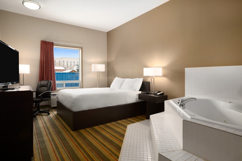 Days Inn by Wyndham Woodstock | 560 Norwich Avenue, 401 Hwy Exit 232, Woodstock, ON N4V 1C6, Canada | Phone: (226) 242-0474