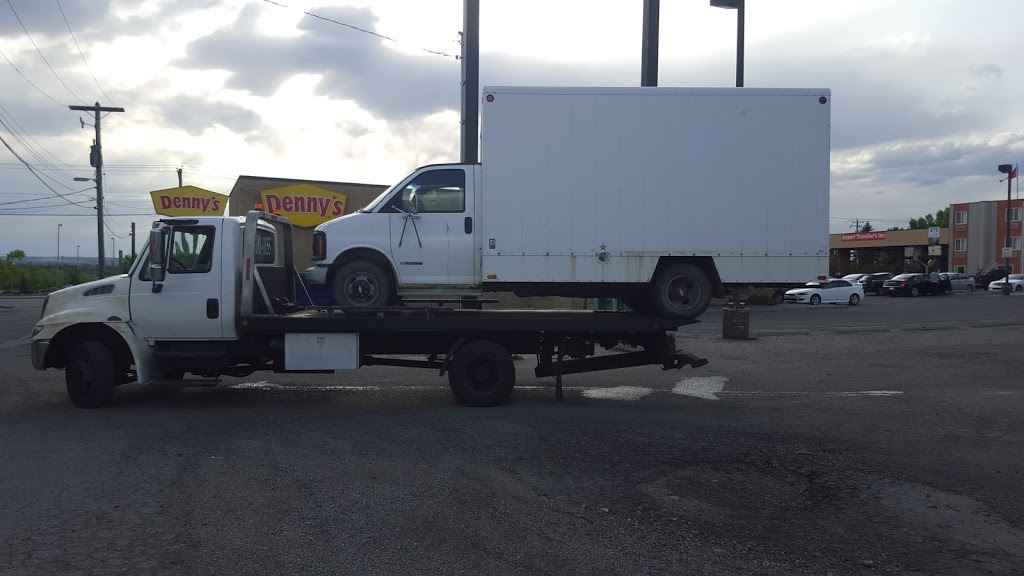 Js Auto Towing Ltd | 1525 38 St SE, Calgary, AB T2A 1G7, Canada | Phone: (403) 681-1155
