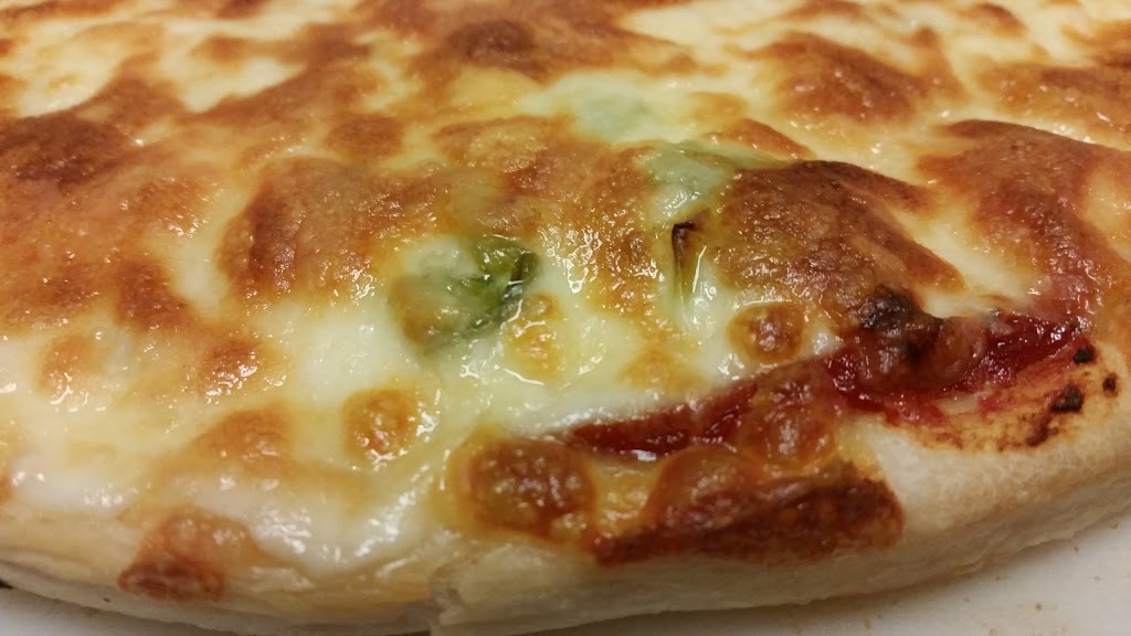 Oakridge Pizza | #105, 2515 90 Ave SW, Calgary, AB T2V 0L8, Canada | Phone: (403) 281-5400