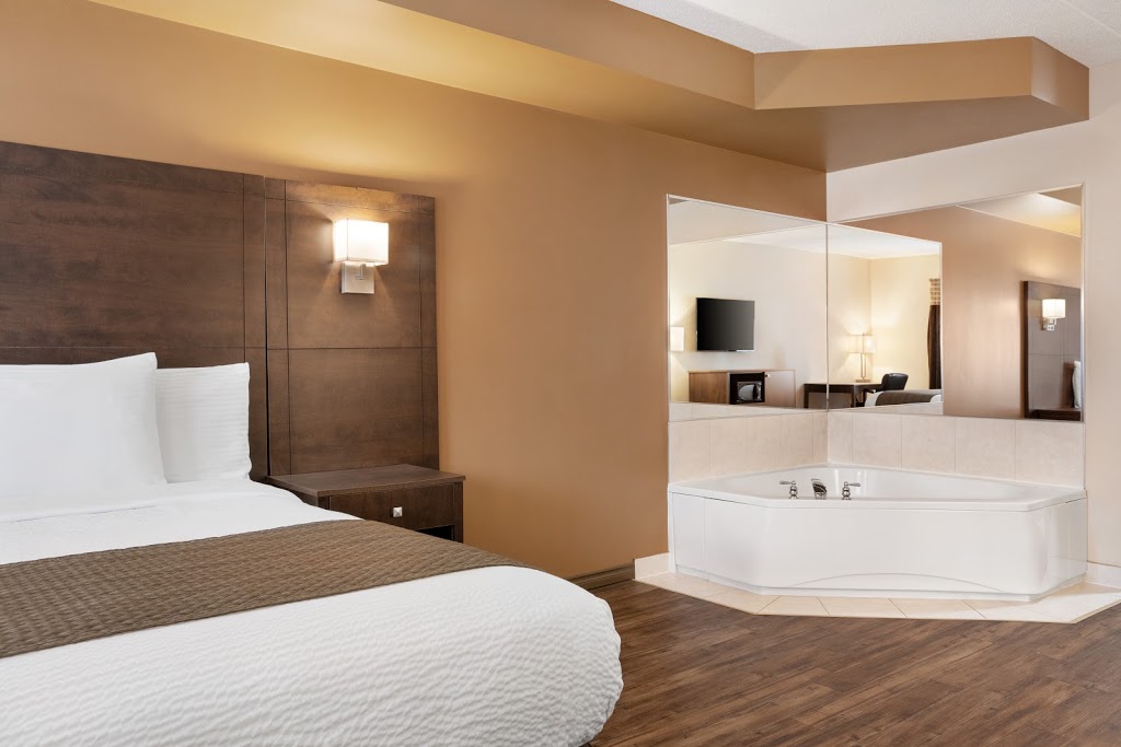 Days Inn by Wyndham Leamington | 201 Erie St N, Leamington, ON N8H 3A5, Canada | Phone: (519) 325-0260