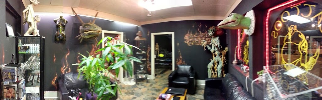 Two Trolls Tattoo Den | 1 King St E, Dundas, ON L9H 1B7, Canada | Phone: (289) 238-9861