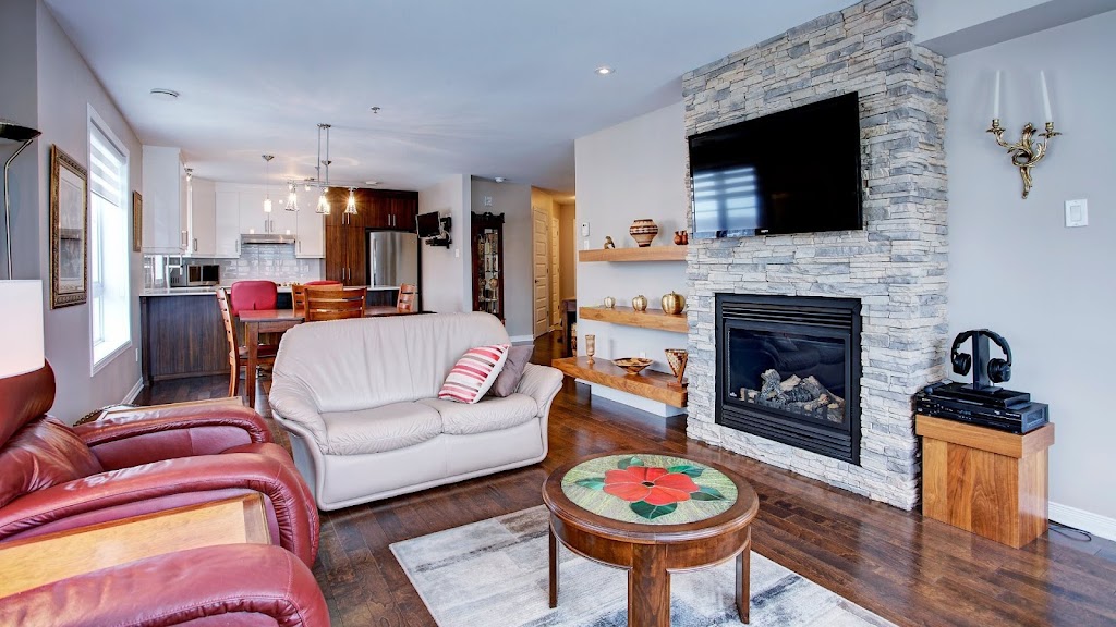 Équipe Sollazzo - Agence immobilière | 66 Bd de la Concorde E, Laval, QC H7G 4S4, Canada | Phone: (450) 669-3999