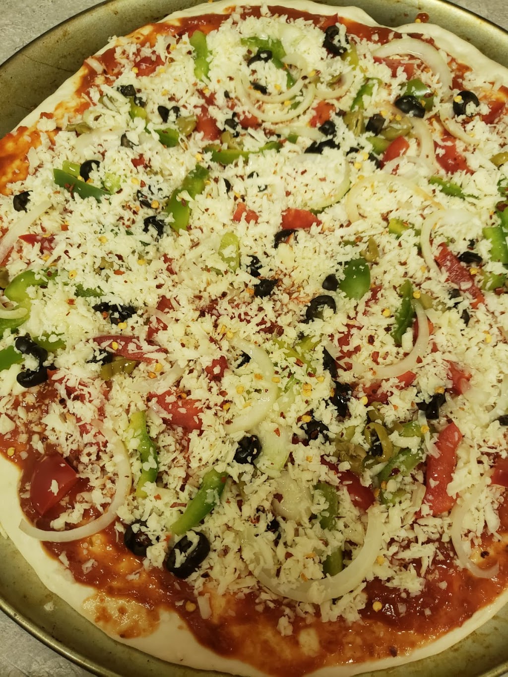 Desi Pizza & Curries | 849 Henderson Hwy, Winnipeg, MB R2K 2L4, Canada | Phone: (204) 504-7100
