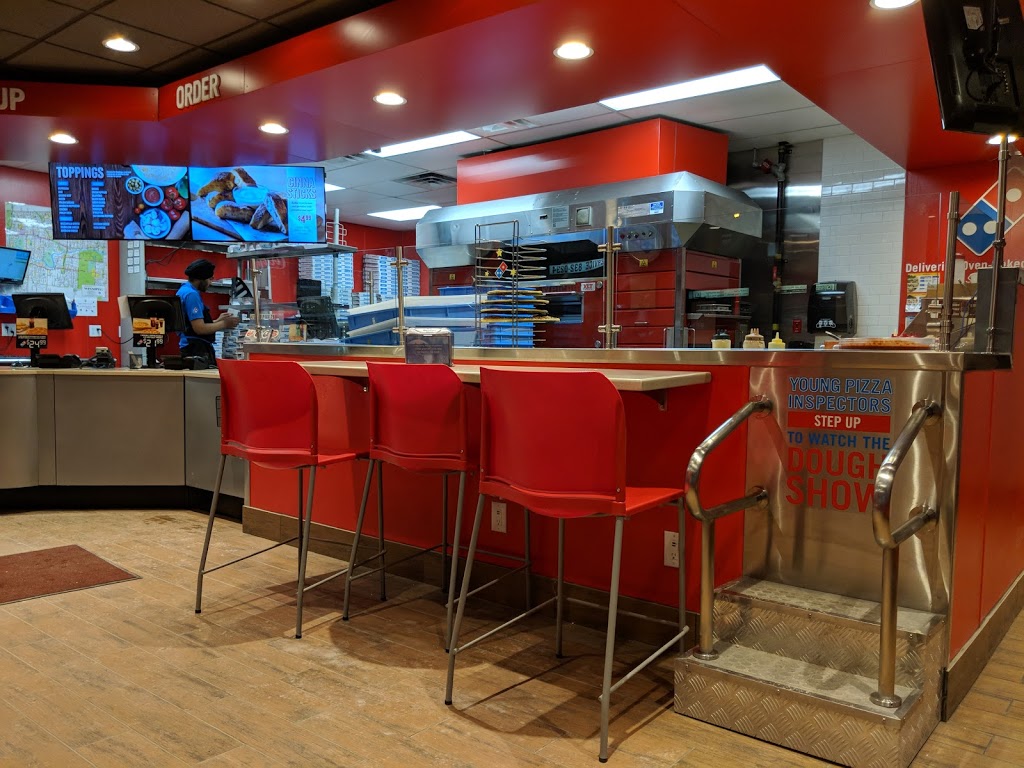 Dominos | 3059 Portage Avenue West, Winnipeg, MB R3K 0W4, Canada | Phone: (204) 987-5555