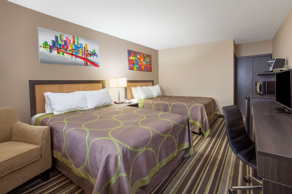 Howard Johnson by Wyndham Winnipeg West | 3740 Portage Ave, Winnipeg, MB R3K 0Z9, Canada | Phone: (204) 272-4169