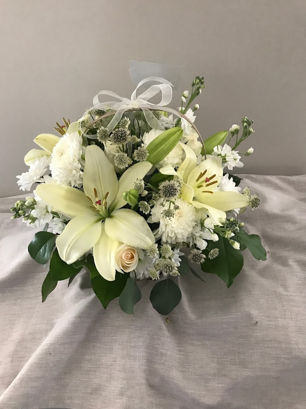 Green vase Flower | 46 Aspen Stone Manor SW, Calgary, AB T3H 0H3, Canada | Phone: (403) 870-6557