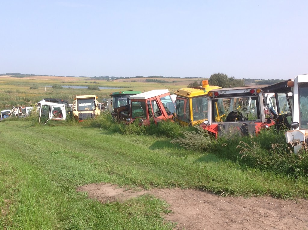 Loeffelholz Tractor & Combine Salvage | Farm Box 367, Cudworth, SK S0K 1B0, Canada | Phone: (306) 256-7107