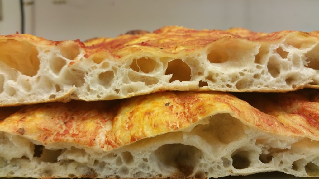 Pizza on the fly | 5111 Northland Dr NW #5230, Calgary, AB T2L 2J8, Canada | Phone: (587) 353-7992