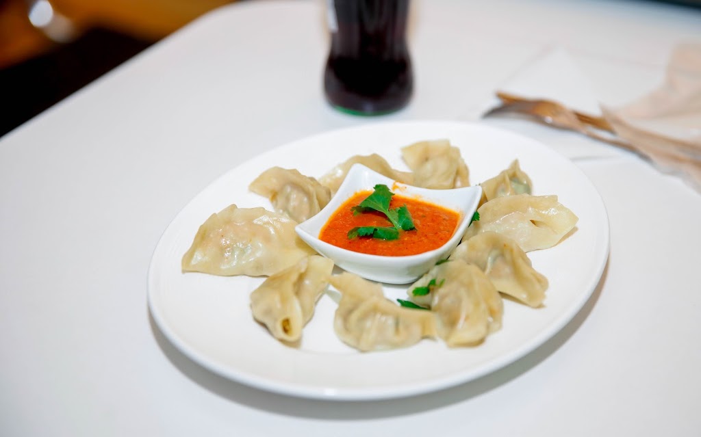MoMos N Tacos Restaurant | 2565 Steeles Ave E Unit 7, Brampton, ON L6T 4L6, Canada | Phone: (905) 230-7776