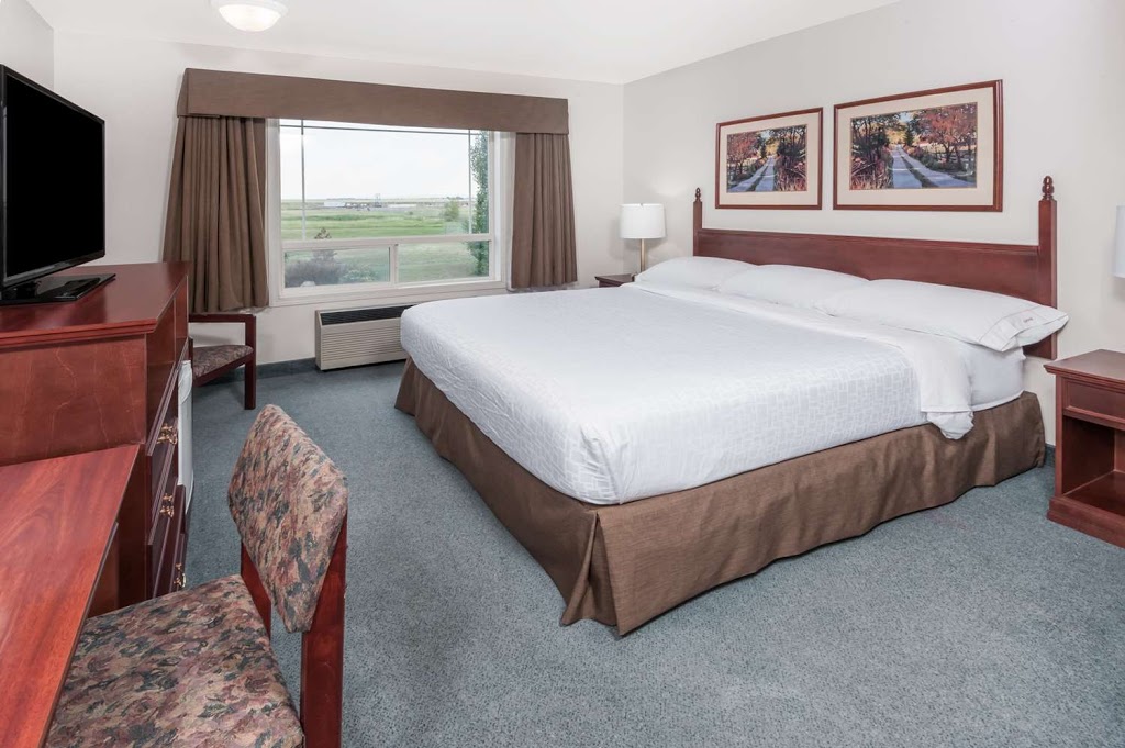 Super 8 by Wyndham High River AB | 1601 13 Ave SE, High River, AB T1V 2B1, Canada | Phone: (403) 652-4448
