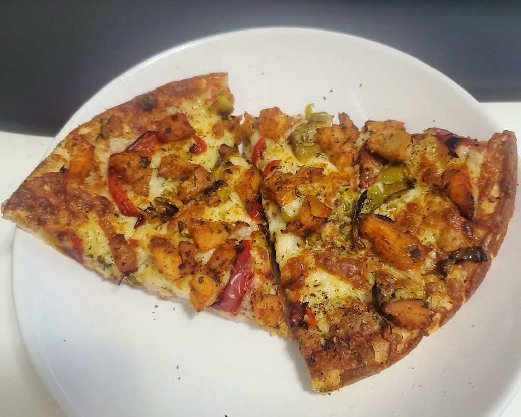 Mannys Pizza | 6440 Main St, Vancouver, BC V5W 2V4, Canada | Phone: (604) 301-0009