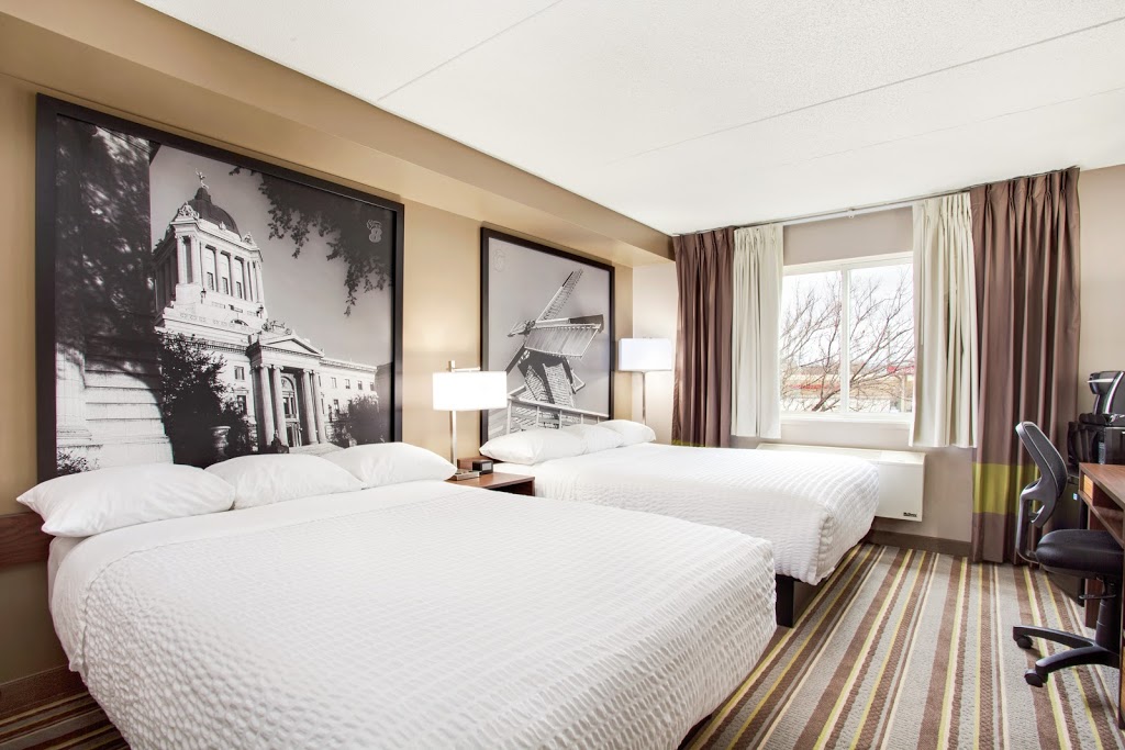 Super 8 by Wyndham Winnipeg West | 3760 Portage Ave, Winnipeg, MB R3K 1A1, Canada | Phone: (204) 831-9800