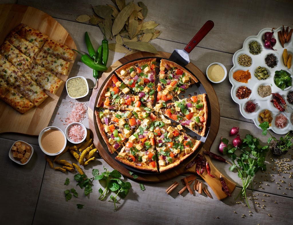 Chicagos Pizza Twist - White Rock, Surrey, BC | restaurant | 2670 152 St #310, Surrey, BC V4P 1M8, Canada | 6047871113 OR +1 604-787-1113