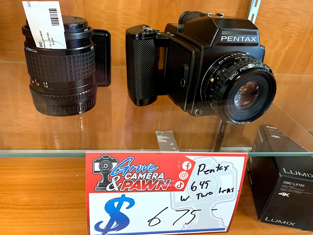 Grove Camera & Pawn | 100 King St #24, Spruce Grove, AB T7X 3A2, Canada | Phone: (780) 257-1741