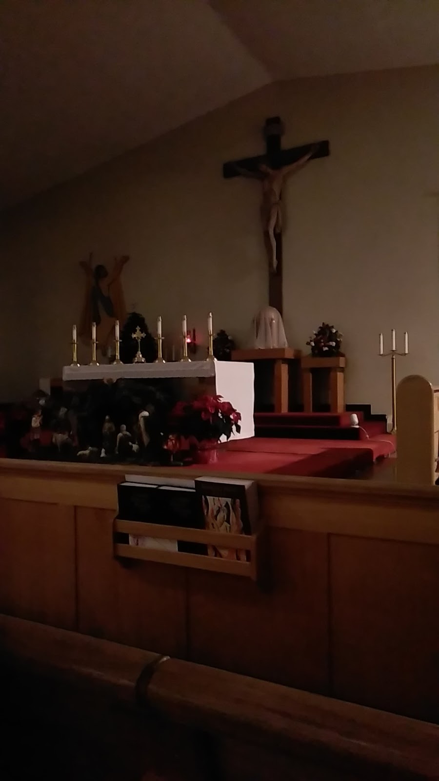 Our Lady of the Assumption Church | 7624 39 Ave NW, Calgary, AB T3B 1X3, Canada | Phone: (403) 283-3746