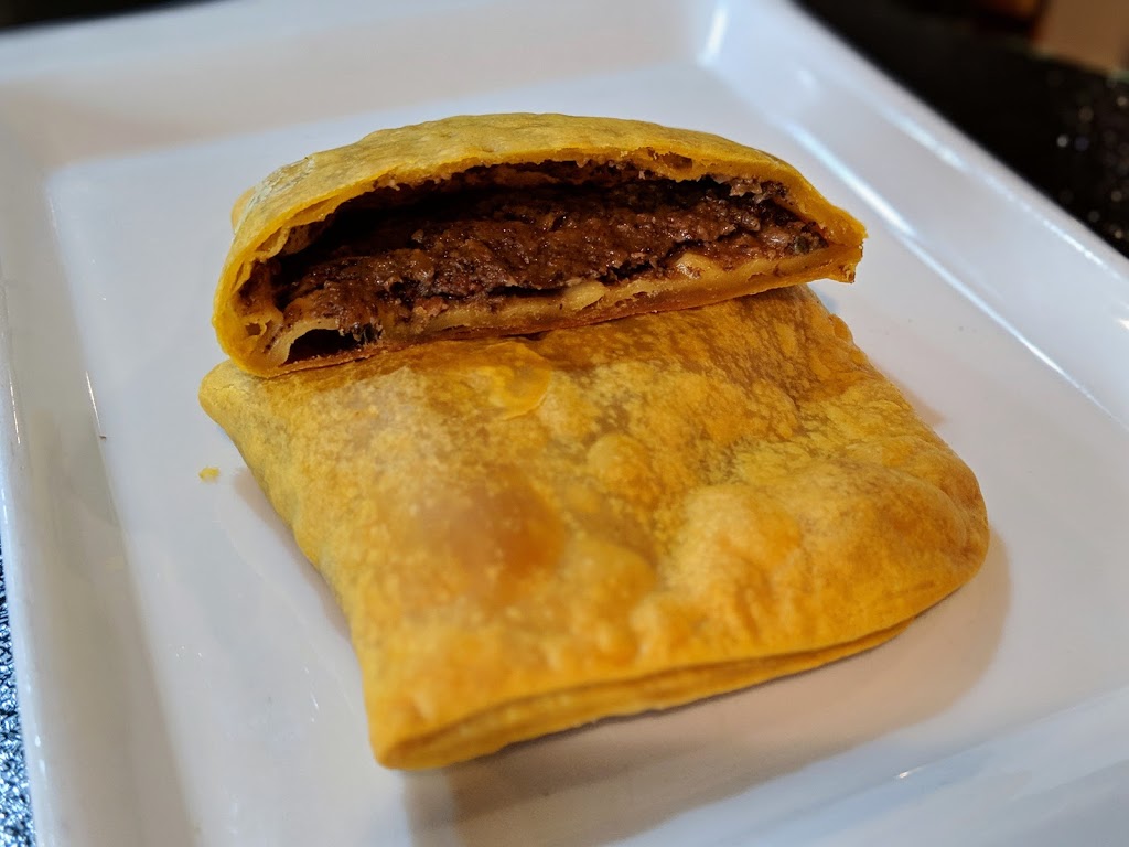 Jamaican Pizza Jerk | 2707 Commercial Dr, Vancouver, BC V5N 4C5, Canada | Phone: (604) 876-3343