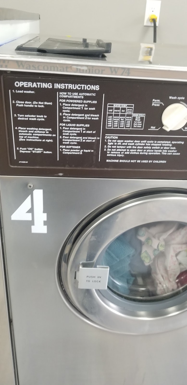 Airdrie Laundromat | 120 1 Ave NE, Airdrie, AB T4B 0R6, Canada | Phone: (403) 948-2169