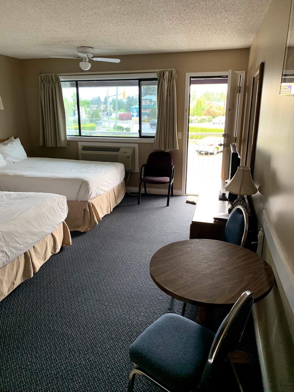 Paradise Seashell Motel | 411 Island Hwy W, Parksville, BC V9P 1A1, Canada | Phone: (250) 248-6171